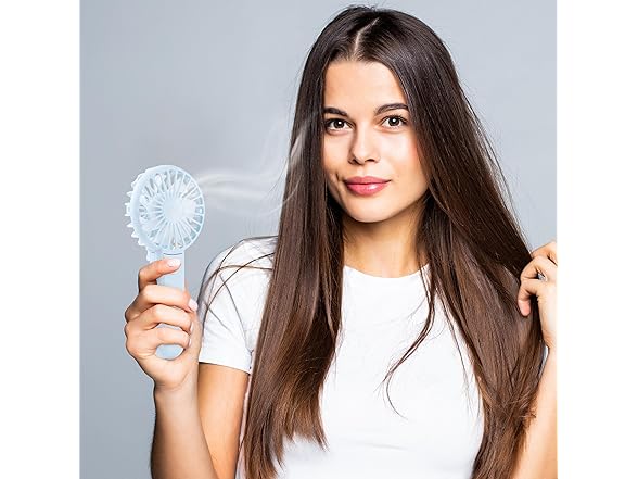 Paris Hilton Handheld Foldable Fan