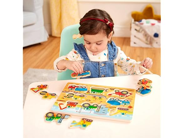 B. toys Peek & Explore Construction Trucks