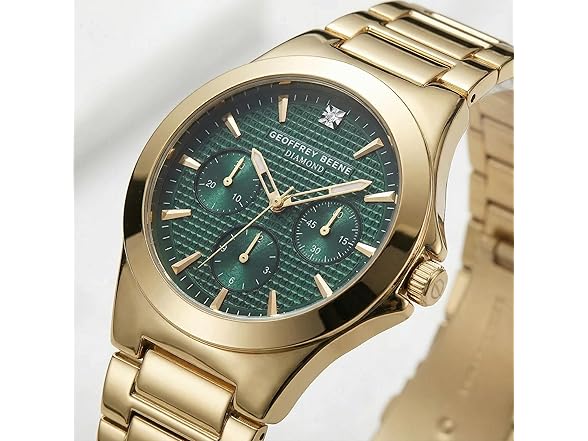 Geoffrey Beene Mens Gunmetal Gold Watch